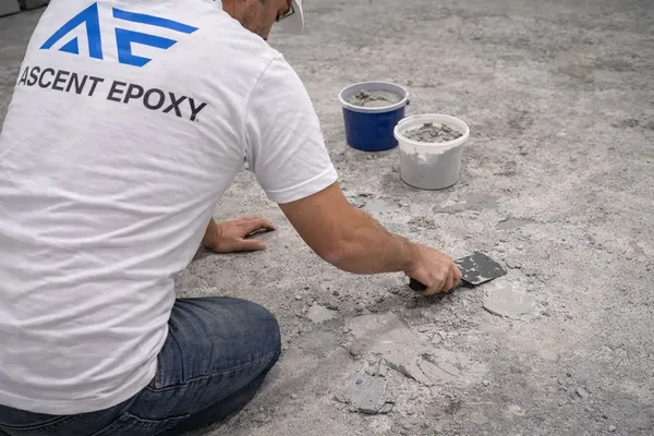Grinding and preparing concrete after coating removal in Tampa
