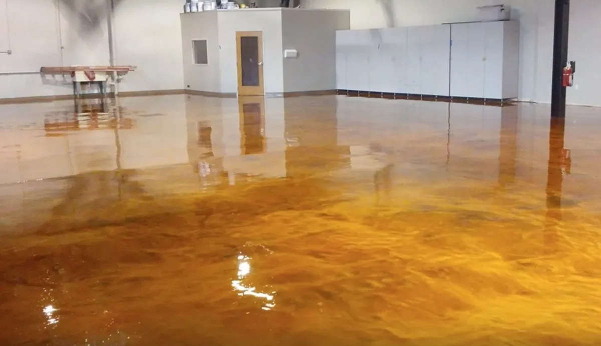 Warehouse epoxy floor with yellow safety line markings Tampa